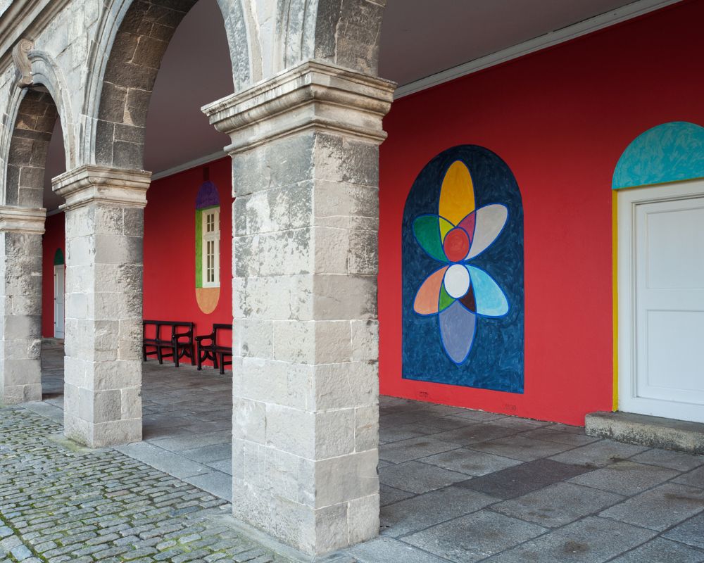 Brightly coloured art installations. Like petals of a flower, the designs are in colours of yellow, red, green sky blue. and this is from the eco art festival at IMMA..