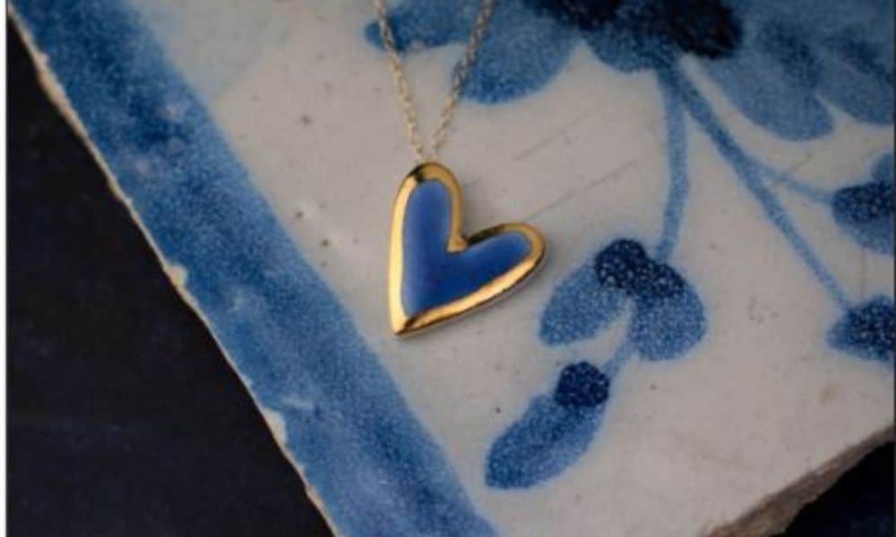 A blue heart encased in gold and set against a blue ceramic tile - from the pop-up that will be held at the Royal Marine Hotel 
