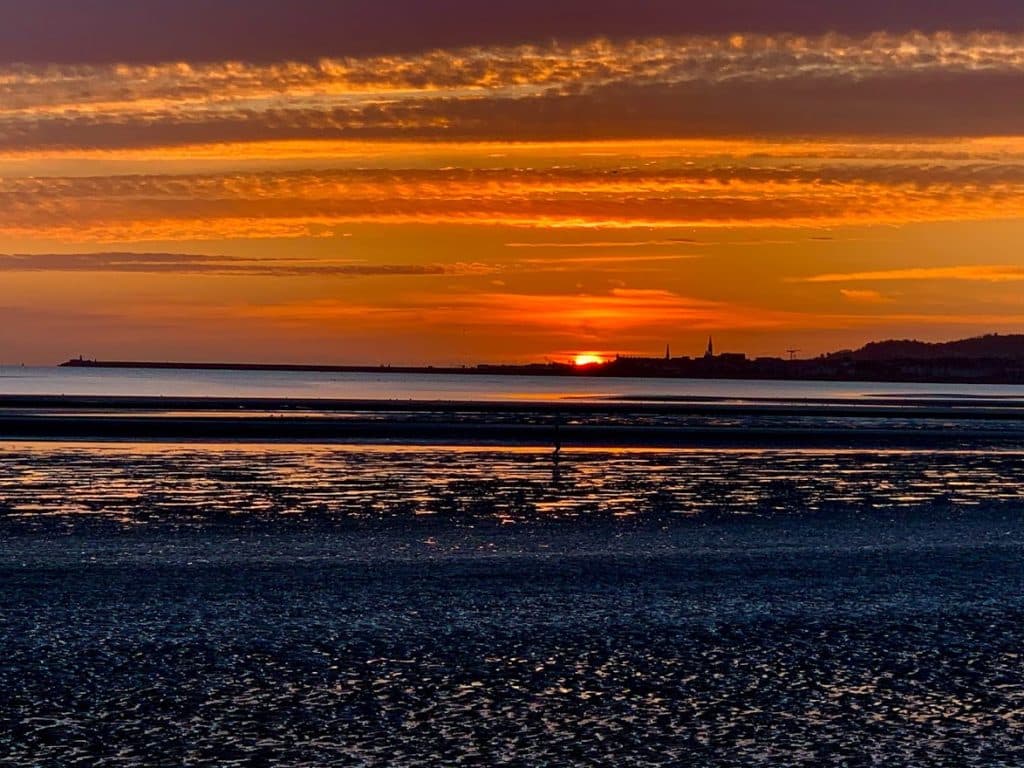 The Sandymount beach sunrise which is also one of the things to do while staying at the hotel for St. Patrick's Day