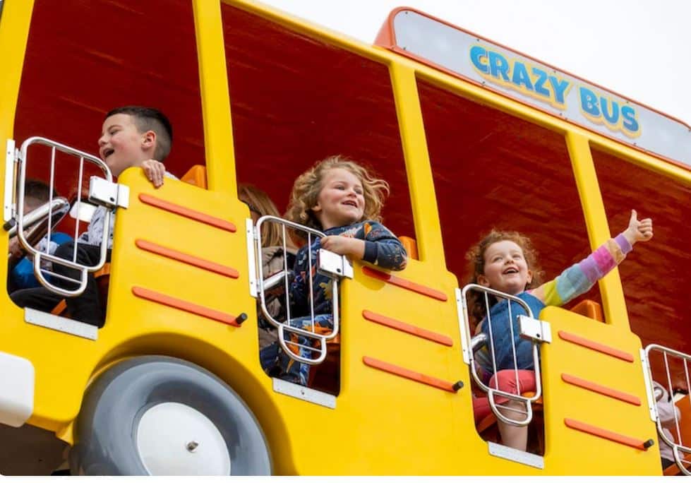 Children aboard crazy bus at Emerald Park 